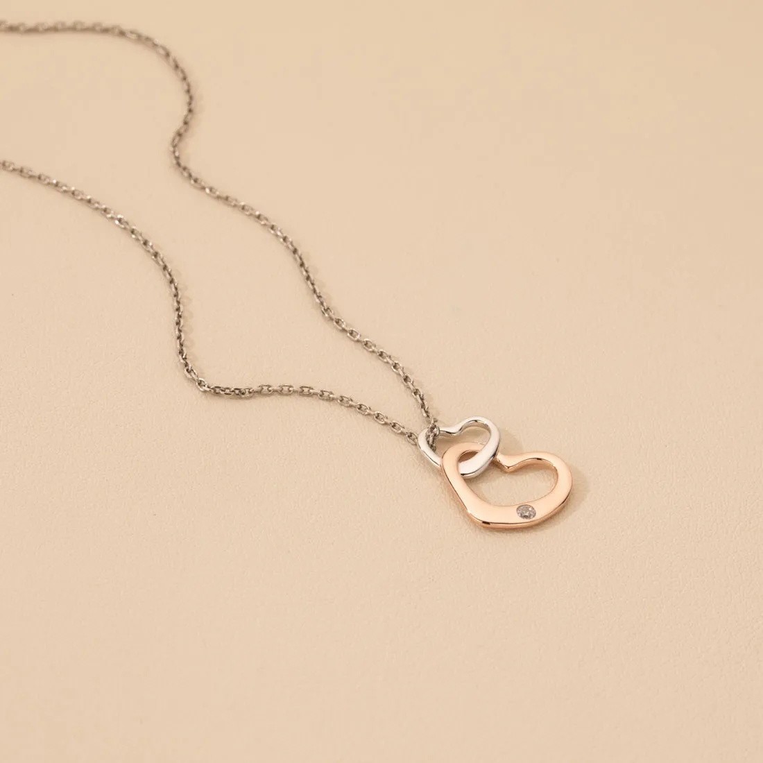 Rose-Tone Sterling Silver Interlocking Hearts Pendant